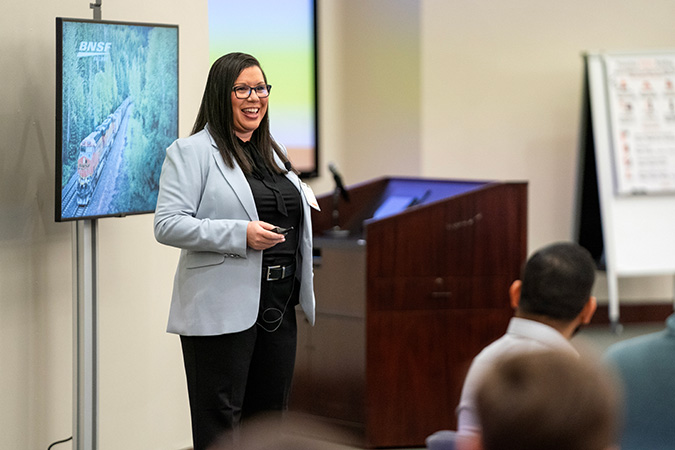 Chief Diversity and Inclusion Officer Kalisha Holland addresses attendees in her welcoming remarks.