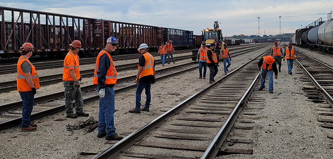 Springfield crew works together to clean up their yard. 