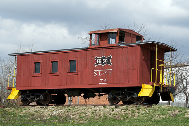 Preserved wooden caboose on display in Missouri